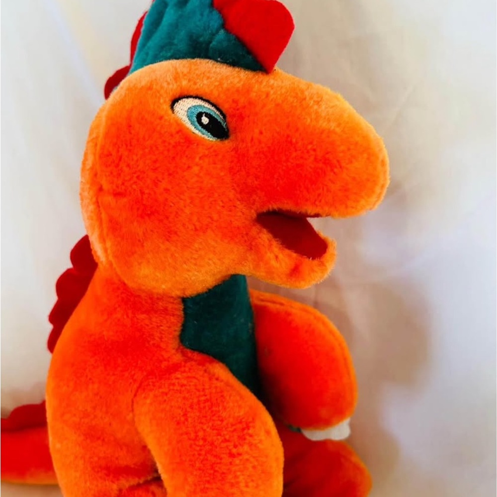 Vintage Plush Orange Dinosaur Toy with Teal Accents